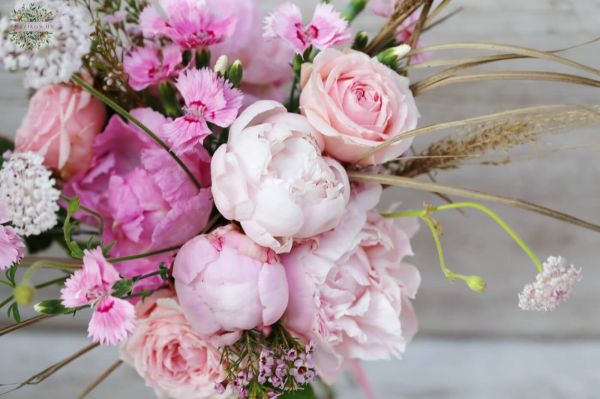 Airy bushy bridal bouquet with peonies and seasonal flowers (pink)