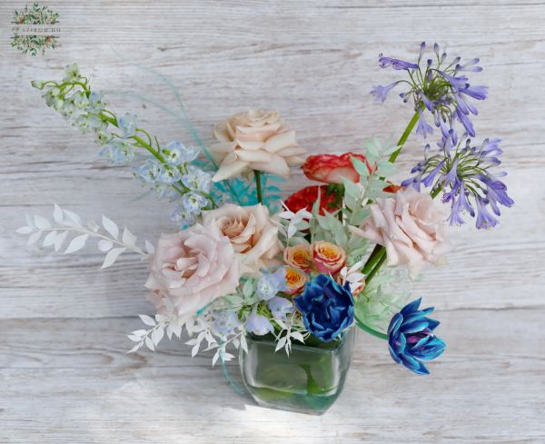 Glass cube with summer vide airy flower composition