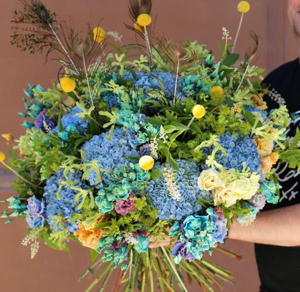 Blue giant luxury bouquet with peacock feathers