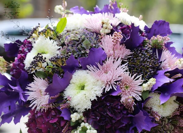 Giant purple autumn bouquet with hydrangeas, chrysants, berries