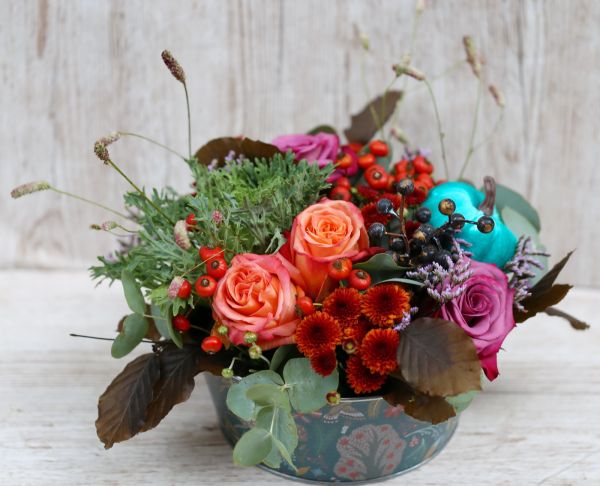 Autumn flower bowl with pumpkin, in metal pot with woodland animal pattern