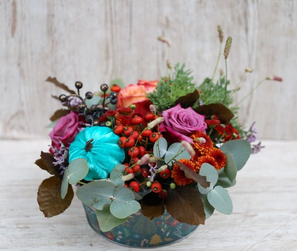 Autumn flower bowl with pumpkin, in metal pot with woodland animal pattern