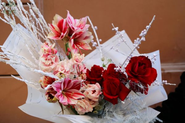 winter red moon shaped bouquet with amaryllis and red roses