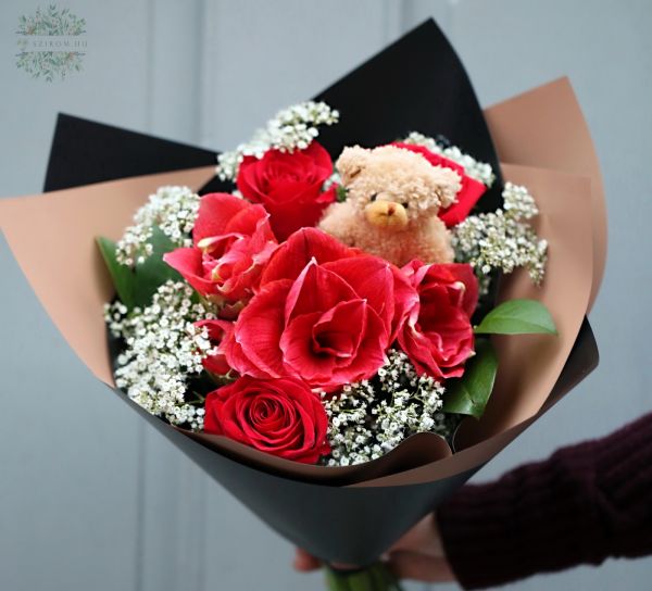 red rose bouqet with amaryllis, baby's breath and a teddy bear