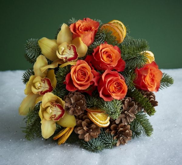 Bouquet with orange slices, roses and orchids