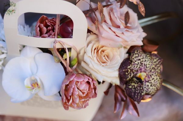 Modern elegant feminine bag bouquet with orchids, in theme color of the year Mocha Mousse