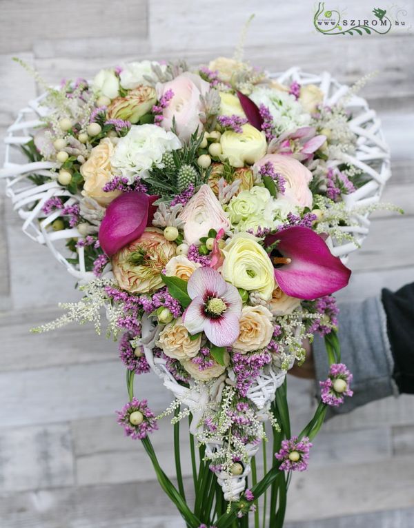 Bridal bouquet in heart shape (Anemone, English rose, bushy rose, ranunculus, calla, eryngium, limonium, hypericum, pink, white)