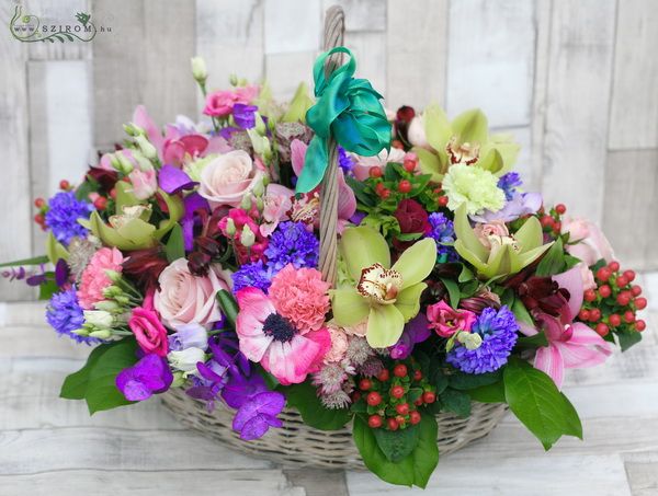 Vibrant colors, 65 stems of flowers in basket