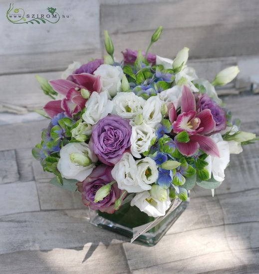 Fresh cube of hydrangeas, lisianthuses, orchids, roses