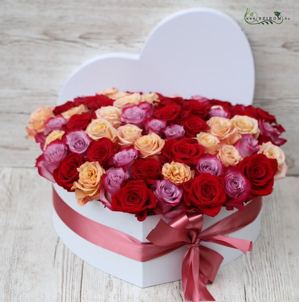 50 roses in heart shaped box with warm colors