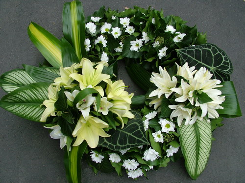 flower delivery Budapest - ivory wreath covered with flowers (70cm)