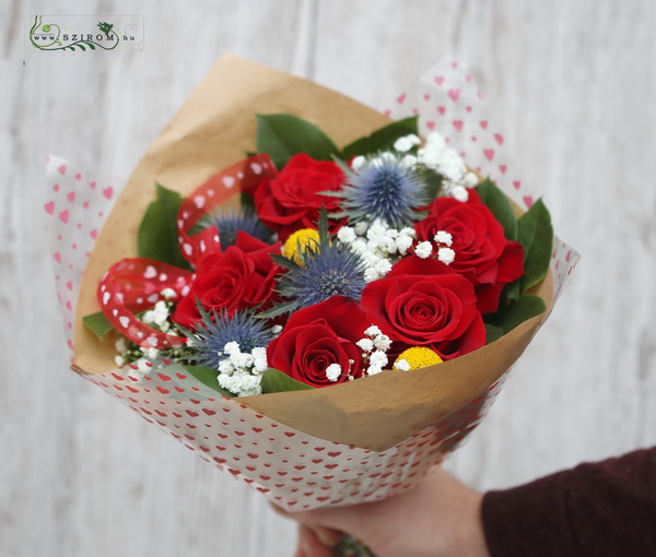 flower delivery Budapest - Small red rose bouquet with eryngiums, craspedias, bouquet paper with hearts