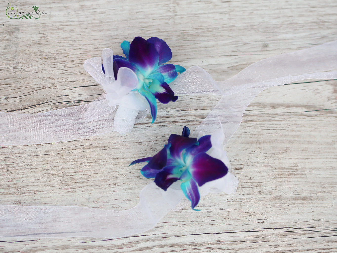 flower delivery Budapest - wrist corsage made of blue dendrobium orchids