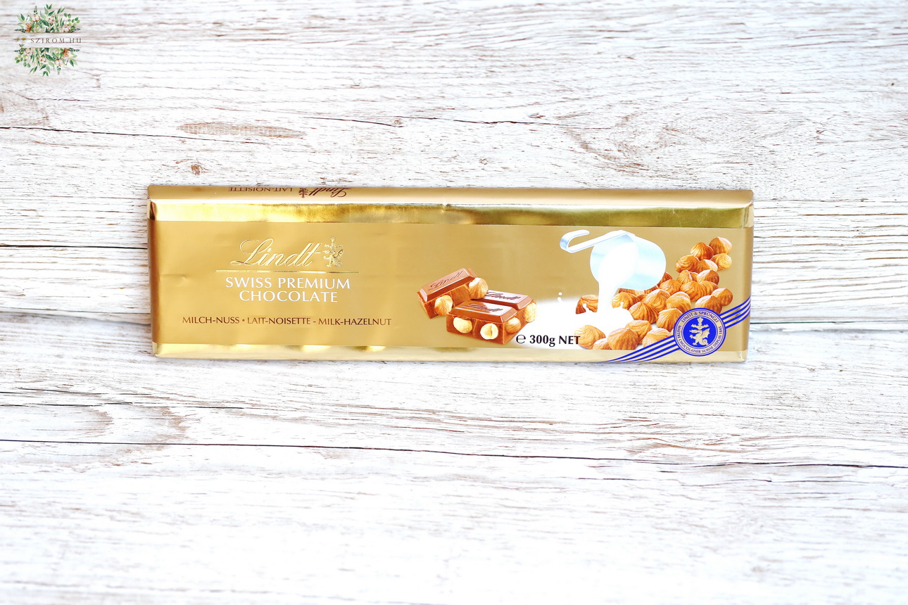 Blumenlieferung nach Budapest - Lindt Schweizer Premium-Milchschokolade mit ganzen Haselnüssen
