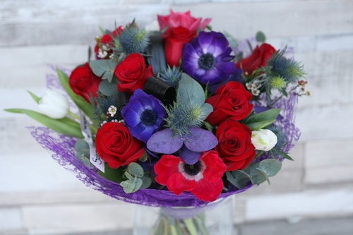 flower delivery Budapest - red rose bouquet with anemones, tulips, wax, in vase (23 stems)