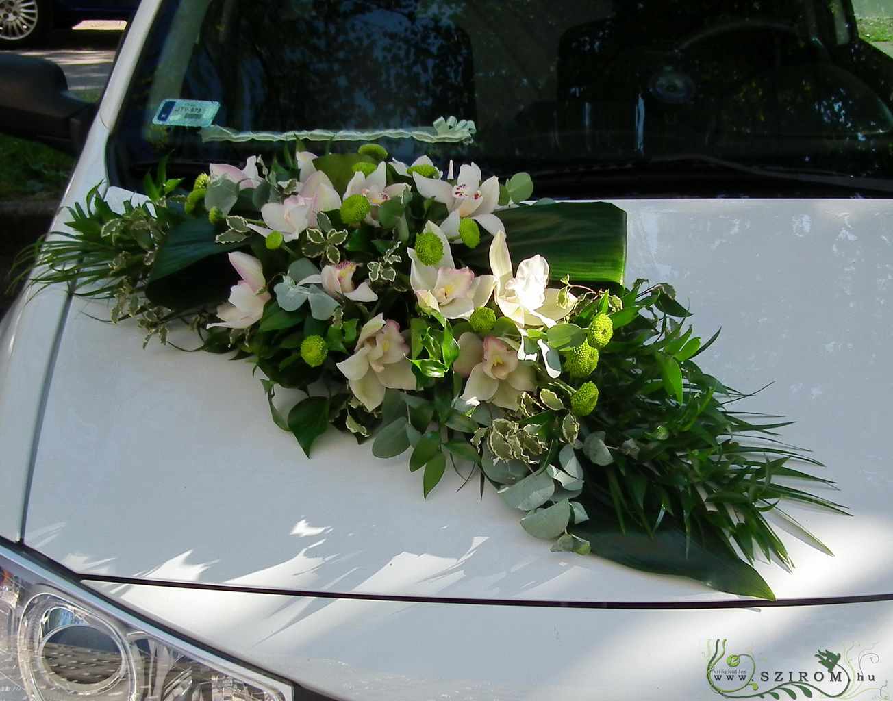 flower delivery Budapest - oval car flower arrangement with orchids (white, green, pink)