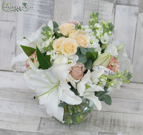 flower delivery Budapest - glass ball with peach roses, white lilies, carnations, stockflower (18 stems)
